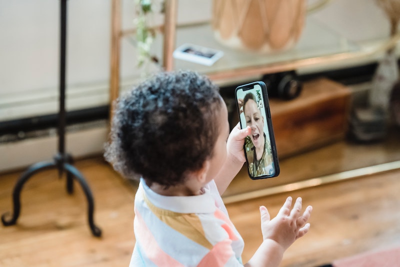 Child talking to parent. Photo by George Pak from Pexels.